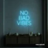 No Bad Vibes neon sign in ice blue for dorm walls, man caves, and modern mood-boosting decor.