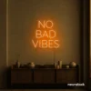No Bad Vibes neon sign in orange for dorm walls, man caves, and modern mood-boosting decor.