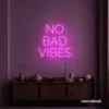 No Bad Vibes neon sign in pink for dorm walls, man caves, and modern mood-boosting decor.