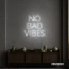 No Bad Vibes neon sign in white for dorm walls, man caves, and modern mood-boosting decor.