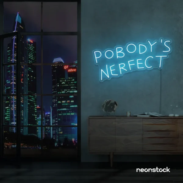 Nobody's Perfect neon sign in ice blue for humorous decor, vanity setups, and real-life vibes.
