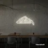 Pizza slice neon sign in neutral white for pizzerias, fast food joints, and restaurant wall decor.