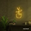 Plant neon sign in golden yellow for home decor