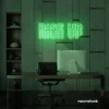 Rise Up neon sign in green for gyms, empowerment decor, and motivational spaces.