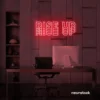 Rise Up neon sign in red for gyms, empowerment decor, and motivational spaces.