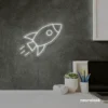 Rocket neon sign in white for kids' rooms, play areas, and space-themed nursery decor.