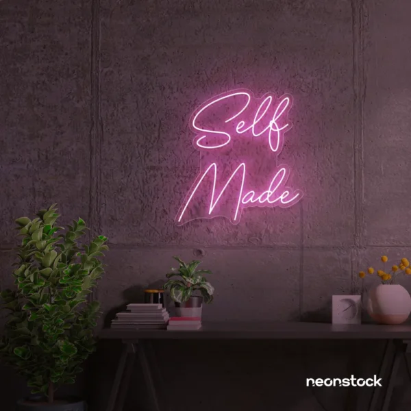 Self Made neon sign in baby pink for home offices, studios, and entrepreneur decor.