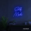Self Made neon sign in dark blue for home offices, studios, and entrepreneur decor.