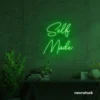 Self Made neon sign in deep green for home offices, studios, and entrepreneur decor.