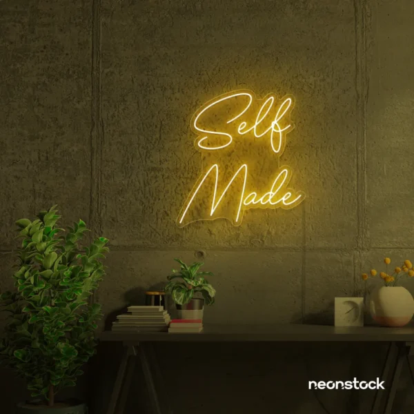 Self Made neon sign in golden yellow for home offices, studios, and entrepreneur decor.
