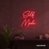 Self Made neon sign in red for home offices, studios, and entrepreneur decor.