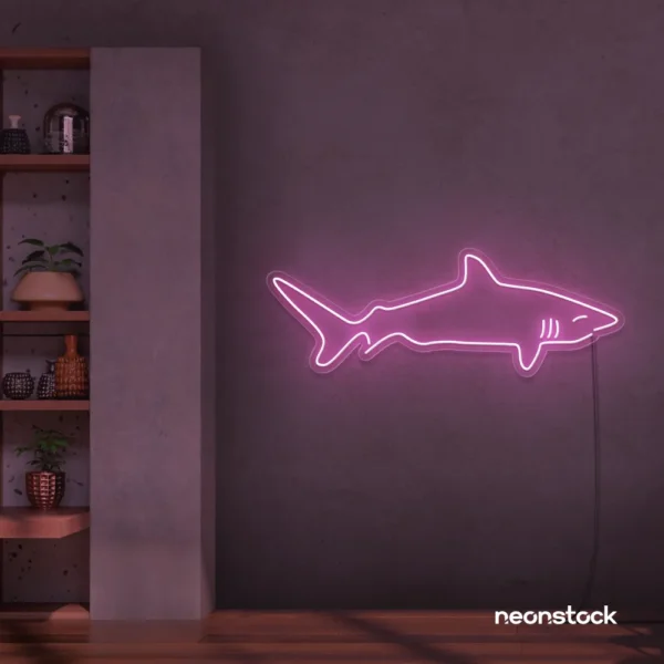 Shark neon sign in baby pink for kids' rooms, ocean-themed decor, and fun playroom walls.