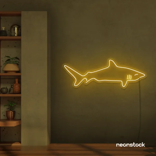 Shark neon sign in golden yellow for kids' rooms, ocean-themed decor, and fun playroom walls.