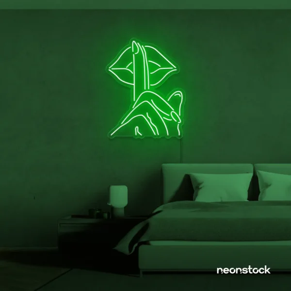Shushing lips neon sign in deep green for beauty salons, glam rooms, and bold home decor.