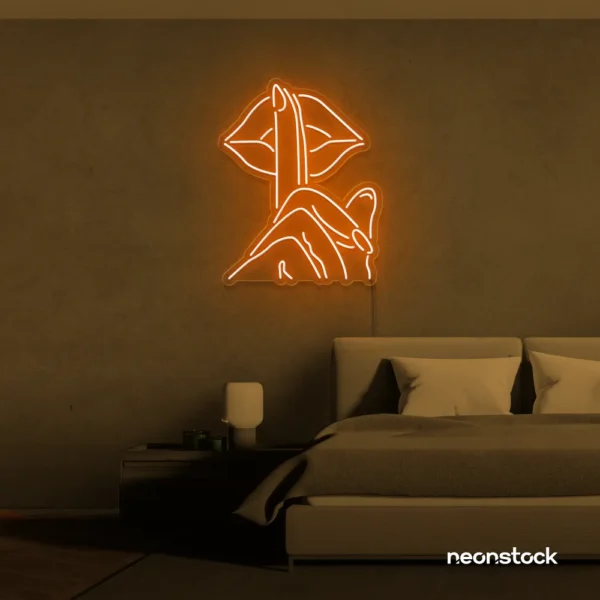 Shushing lips neon sign in orange for beauty salons, glam rooms, and bold home decor.