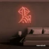 Shushing lips neon sign in peachy pink for beauty salons, glam rooms, and bold home decor.