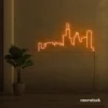 Skyline neon sign in orange for modern wall decor