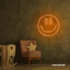 Smiley face neon sign in orange for dorm walls, teen rooms, and joyful room decor.