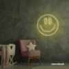 Smiley face neon sign in warm white for dorm walls, teen rooms, and joyful room decor.