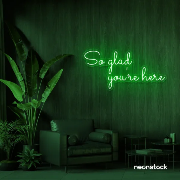 So Glad You Are Here neon sign in deep green for entryways, restaurant walls, and welcoming interiors.