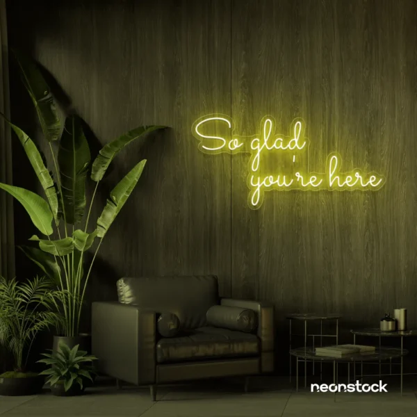 So Glad You Are Here neon sign in lemon yellow for entryways, restaurant walls, and welcoming interiors.
