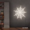 Spider web neon sign in neutral white for kids room wall decor or Halloween-themed spaces