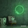 Green neon circle and stars sign glowing on wall – modern LED decor for kids’ rooms and creative spaces