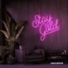 Stay Gold neon sign in pink for glam rooms, babe caves, and feminine decor.