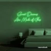 Sweet Dreams Are Made of This neon sign in green for bedrooms, dreamy wall decor, and ambient lighting.