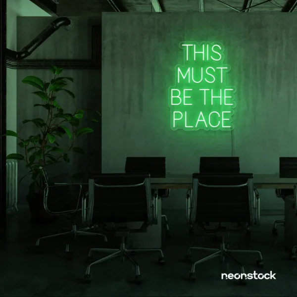 This Must Be The Place neon sign in green for cozy salons, boutique shops, and cafe decor.
