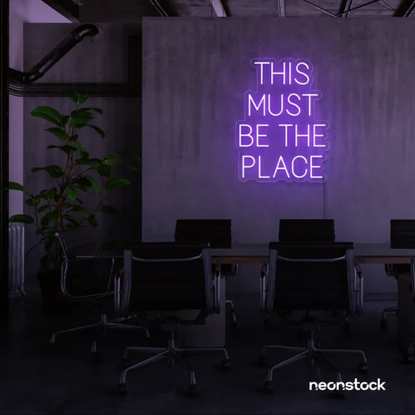 This Must Be The Place neon sign in purple for cozy salons, boutique shops, and cafe decor.