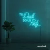Neon sign text 'Till Death Do Us Party' in mint green for wedding decor, romantic event signage, party celebration