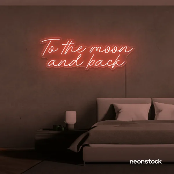 To the Moon and Back neon sign in peachy pink for nursery rooms, kids' spaces, and bedtime wall decor.