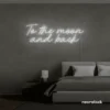 To the Moon and Back neon sign in white for nursery rooms, kids' spaces, and bedtime wall decor.