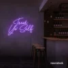 Treat Yo Self neon sign in purple for salons, spas, dessert shops, and cozy home spaces.