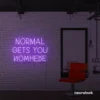 Normal Gets You Nowhere neon sign in purple for bold interiors, creative offices, and motivational decor.