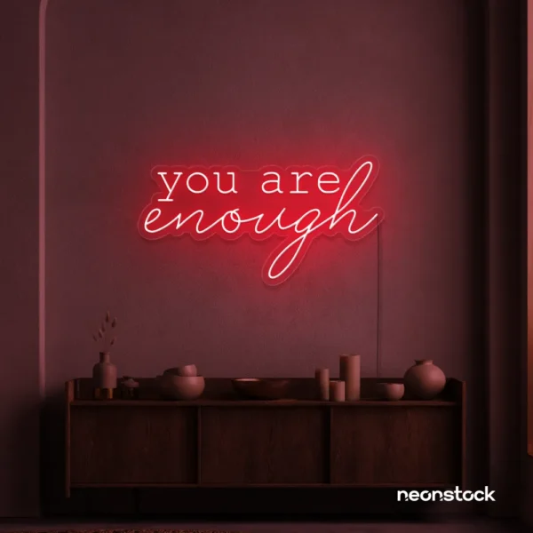You Are Enough neon sign in red for self-love decor, therapy rooms, and calm spaces.